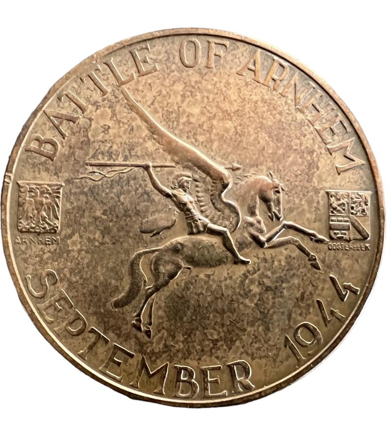 A nice orginal and scarcely encountered Dutch made Battle of Arnhem commemoration coin i.e medallion made in 1946 and designed by J.J. van Goor